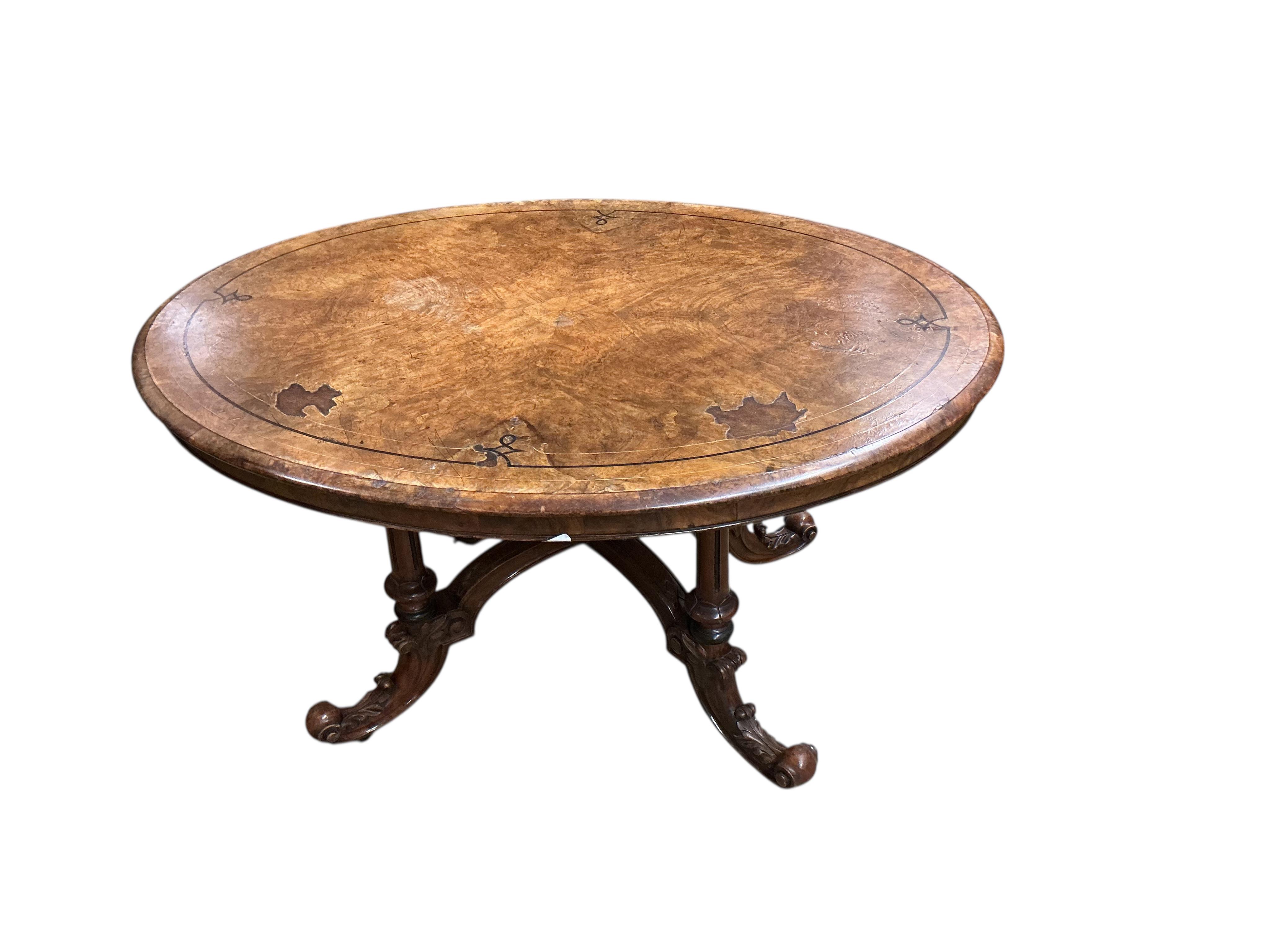 A late Victorian inlaid walnut oval loo table, width 130cm, depth 100cm, height 70cm